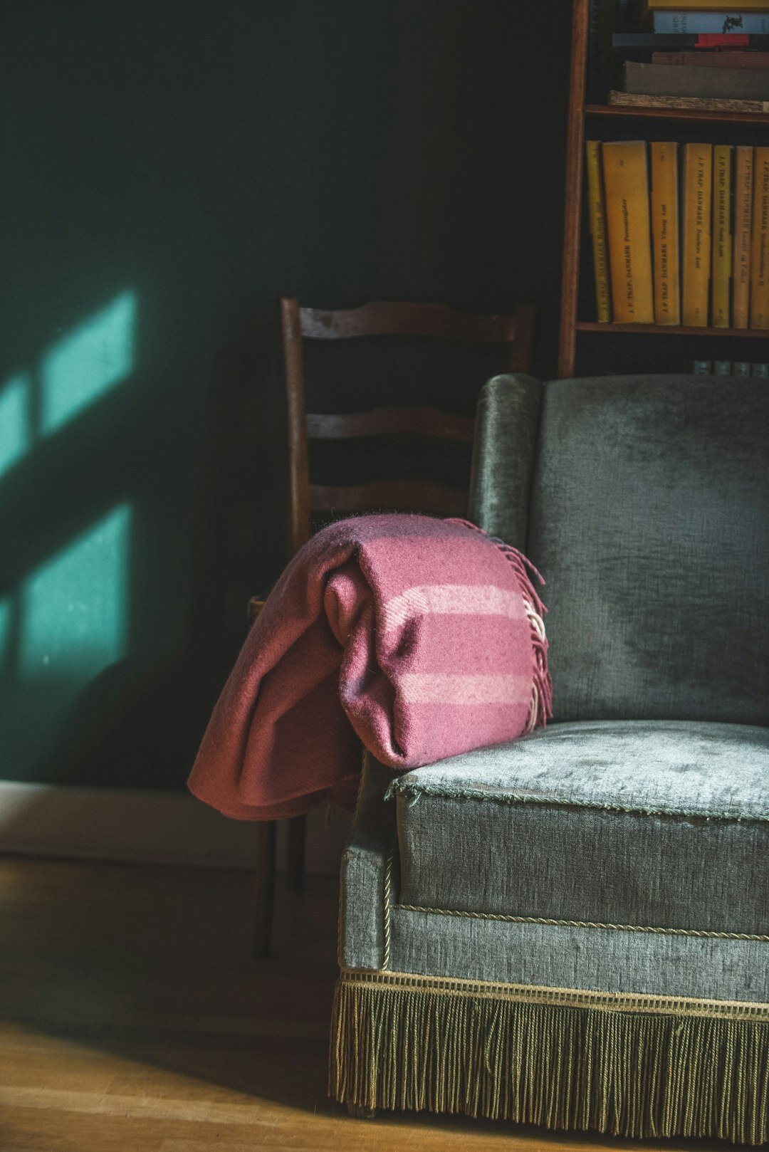 open detective novel on cozy chair