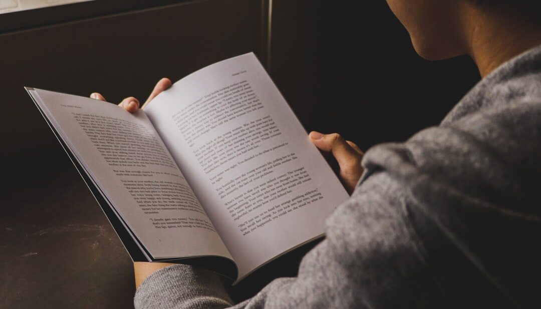 woman reading book